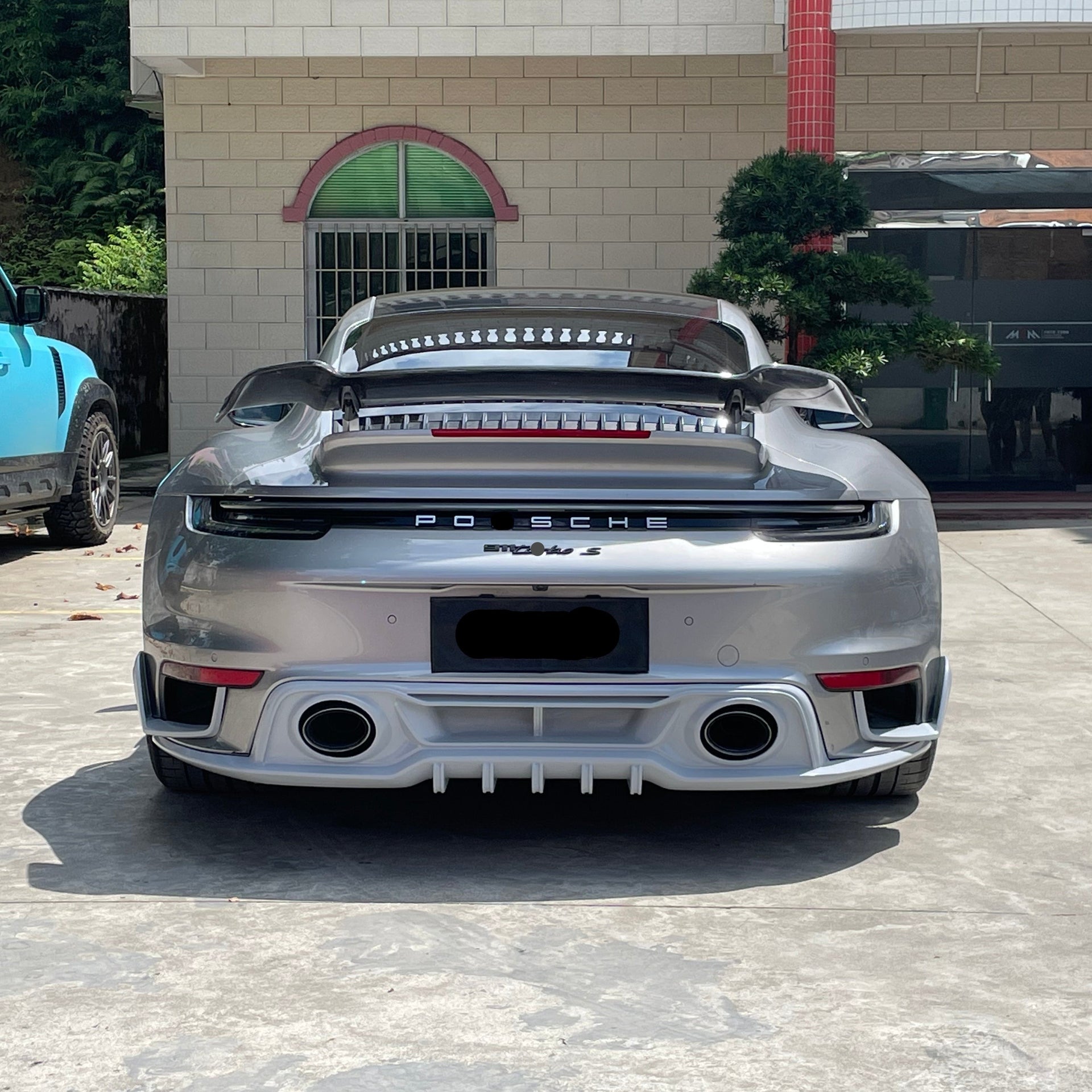 FULL CARBON BODY KIT for PORSCHE 911 (992) 2018+  Set includes:  Front Apron Front Lip / Spoiler Front Hood / Bonnet Side Fenders with Air Outlet Mirrors Side Skirts Side Air intakes Rear Apron Rear Diffuser Engine Hood / Bonnet Roof Spoiler Rear Spoiler / Wing