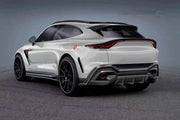 DRY CARBON BODY AERO KIT for ASTON MARTIN DBX
Set includes:
Front Lip
Hood Air Vents
Side Fenders
Fender Flares
Side Skirts
Roof Spoiler
Rear Bumper
Rear Spoiler
Rear Diffuser
Material: Dry Carbon
Note: Professional installation is required