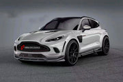 DRY CARBON BODY AERO KIT for ASTON MARTIN DBX
Set includes:
Front Lip
Hood Air Vents
Side Fenders
Fender Flares
Side Skirts
Roof Spoiler
Rear Bumper
Rear Spoiler
Rear Diffuser
Material: Dry Carbon
Note: Professional installation is required