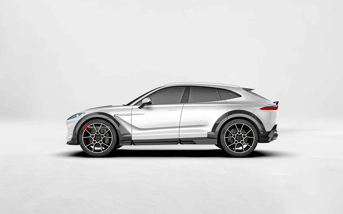 DRY CARBON BODY AERO KIT for ASTON MARTIN DBX
Set includes:
Front Lip
Hood Air Vents
Side Fenders
Fender Flares
Side Skirts
Roof Spoiler
Rear Bumper
Rear Spoiler
Rear Diffuser
Material: Dry Carbon
Note: Professional installation is required