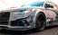 AUTHENTIC DARWINPRO DTM STYLE CARBON WIDE BODY KIT for AUDI RS6 C7 AVANT 2014 - 2018 Set includes: Hood Front lip Front canards Fender flares Side skirts Side canards Bumper spoiler Rear bumper canards Door canards Rear fender canards Rear diffuser canards Roof spoiler Trunk spoiler Material: Carbon fiber / Forged Carbon / Fiberglass + Carbon / Autoclave carbon fiber / Double sided carbon fiber NOTE: Professional installation is required Contact us for pricing