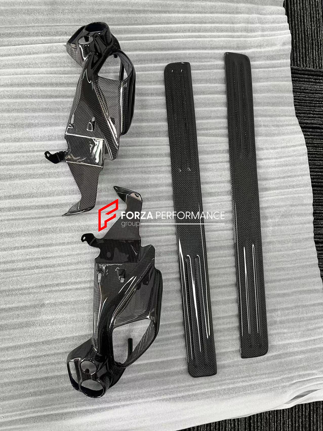 FORZA DRY CARBON INTERIOR KIT for FERRARI 488 GTB, SPIDER  Set includes:  Door Sills Air Conditioning Trims Glove Box Panel Shift Paddles Air Conditioning Control Panel Center Console Bridge Inner Door Panels