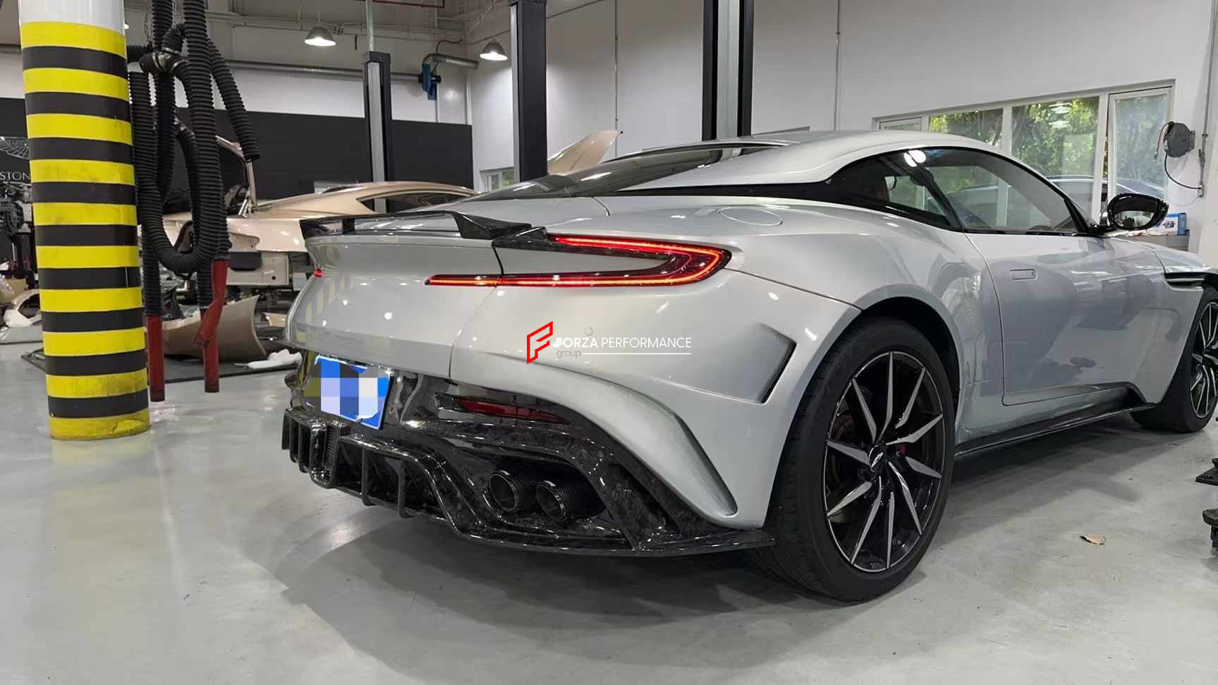 MANSORY CYRUS STYLE FORGED CARBON BODY KIT for ASTON MARTIN DB11      Set includes:  Front Bumper  Front Grille Front Lip Rear Bumper Rear Diffuser with LED Light Side Skirts Hood / Bonnet Mirror Covers Slats For Front Wheel Arch Rear Spoiler