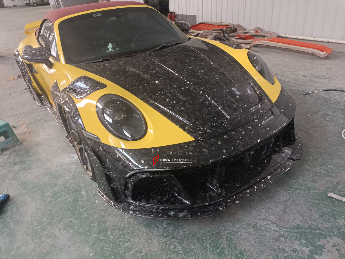 MANSORY STYLE FORGED CARBON BODY KIT for PORSCHE 911 992 CARRERA TURBO S
Set includes:
Front Bumper Assembly
Hood
Fender Flares
Fender Vents
Side Mirror Covers
Side Skirts
Side Vent Covers
Rear Bumper Assembly