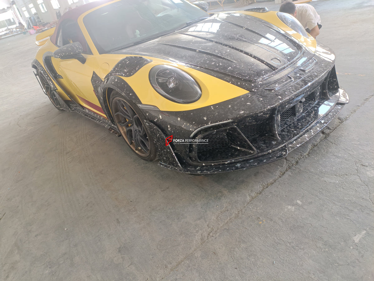 MANSORY STYLE FORGED CARBON BODY KIT for PORSCHE 911 992 CARRERA TURBO S
Set includes:
Front Bumper Assembly
Hood
Fender Flares
Fender Vents
Side Mirror Covers
Side Skirts
Side Vent Covers
Rear Bumper Assembly