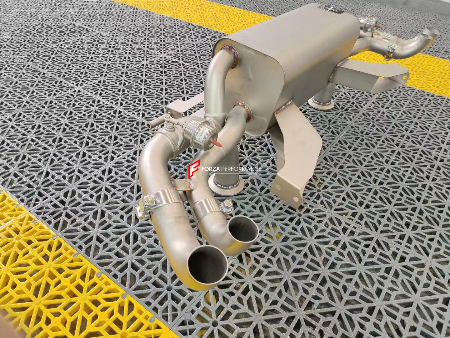 VALVED EXHAUST CATBACK MUFFLER for AUDI R8 (4.2L) V8 2006 - 2012  Valved exhaust, meaning that has remote, controlled valves - allowing a switch between an aggressive loud sports sound and a sound that is closer to the OEM sound.  Set includes:  Muffler with valves