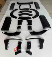 WIDE BODY KIT for AUDI Q7 4M FACELIFT 2019 - 2024
Set includes:
Front Lip Inserts
Side Skirts
Side Fenders
Rear Spoiler
Material: FRP Fiberglass
NOTE: Professional installation is required