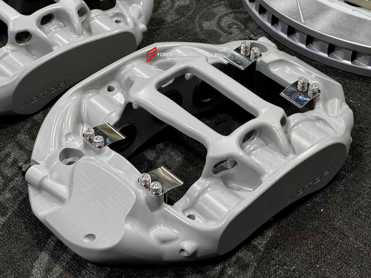ADTORY X FORZA PERFORMANCE RACE BIG BRAKE KIT BBK for BMW M2 F87 LCI 2015 - 2021
ADTORY Brake Kits are engineered as bolt on upgrades that work with the factory master cylinder and ABS, delivering stronger, more repeatable stops with the pedal feel you want. Whether you cruise the city, carve canyons, or chase lap times.
Highlights
Track-ready, heat-resistant components.
Jewel-like caliper finish is incredibly durable and easy to clean
Pistons are calibrated to integrate smoothly with the Factory OEM mas