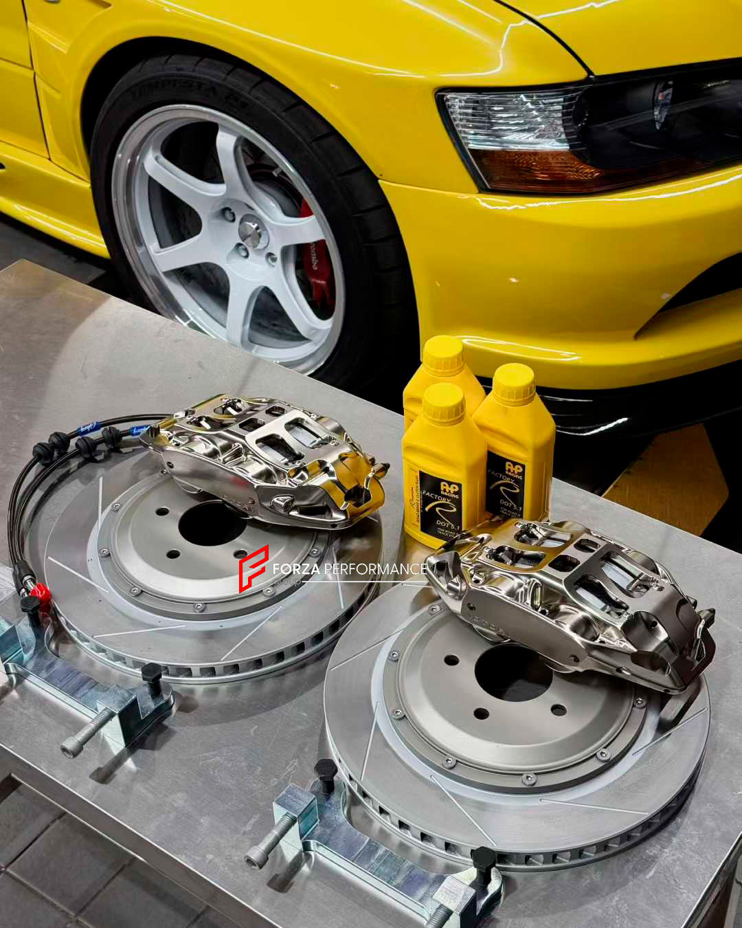 ADTORY X FORZA PERFORMANCE RACE BIG BRAKE KIT BBK for MITSUBISHI LANCER EVOLUTION VII VIII IX CT 2001 - 2007
ADTORY Brake Kits are engineered as bolt on upgrades that work with the factory master cylinder and ABS, delivering stronger, more repeatable stops with the pedal feel you want. Whether you cruise the city, carve canyons, or chase lap times.
Highlights
Track-ready, heat-resistant components.
Jewel-like caliper finish is incredibly durable and easy to clean
Pistons are calibrated to integrate smoot