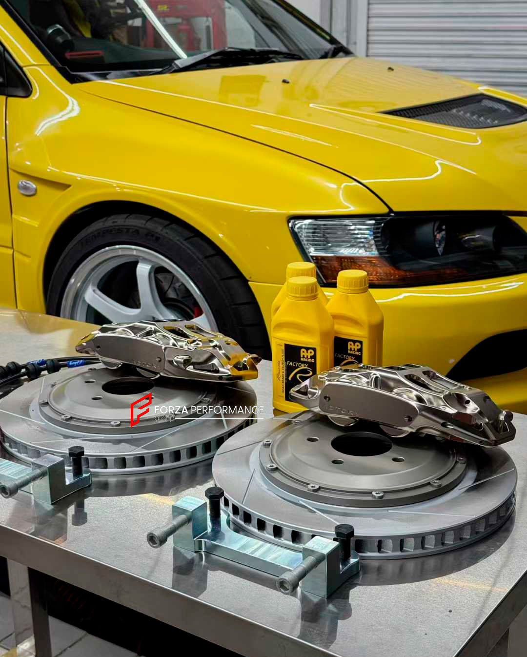 ADTORY X FORZA PERFORMANCE RACE BIG BRAKE KIT BBK for MITSUBISHI LANCER EVOLUTION VII VIII IX CT 2001 - 2007
ADTORY Brake Kits are engineered as bolt on upgrades that work with the factory master cylinder and ABS, delivering stronger, more repeatable stops with the pedal feel you want. Whether you cruise the city, carve canyons, or chase lap times.
Highlights
Track-ready, heat-resistant components.
Jewel-like caliper finish is incredibly durable and easy to clean
Pistons are calibrated to integrate smoot