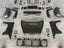 BODY KIT for SUZUKI JIMNY JB64 2019 Set includes: Hood Front Grille Front Bumper Front Bumper Grille Headlights Headlight Covers Turn Signals Turn Signal Covers Fender Flares Roof LED Bar Mirrors Side Fenders Side Skirts Side Trims Rear Bumper Tail Lights Spare Tire Cover