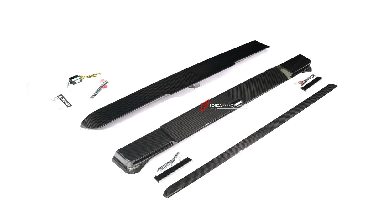 DRY CARBON BODY KIT for MERCEDES BENZ G CLASS G500 G450D W465 2024+
Set includes:
Front Lip
Front Bumper Covers
Turning Light Frame Cover
Hood Scoop
Roof Light Bar
Roof Trim
A-Pllar Cover
Window Frame Covers
Side Molding Trims
Roof Spoiler
D-Pillar Add-Ons
Rear Fender Flare
Rear Trunk Cover
Rear Bumper Covers
Rear Diffuser
Material: Dry Carbon Fiber