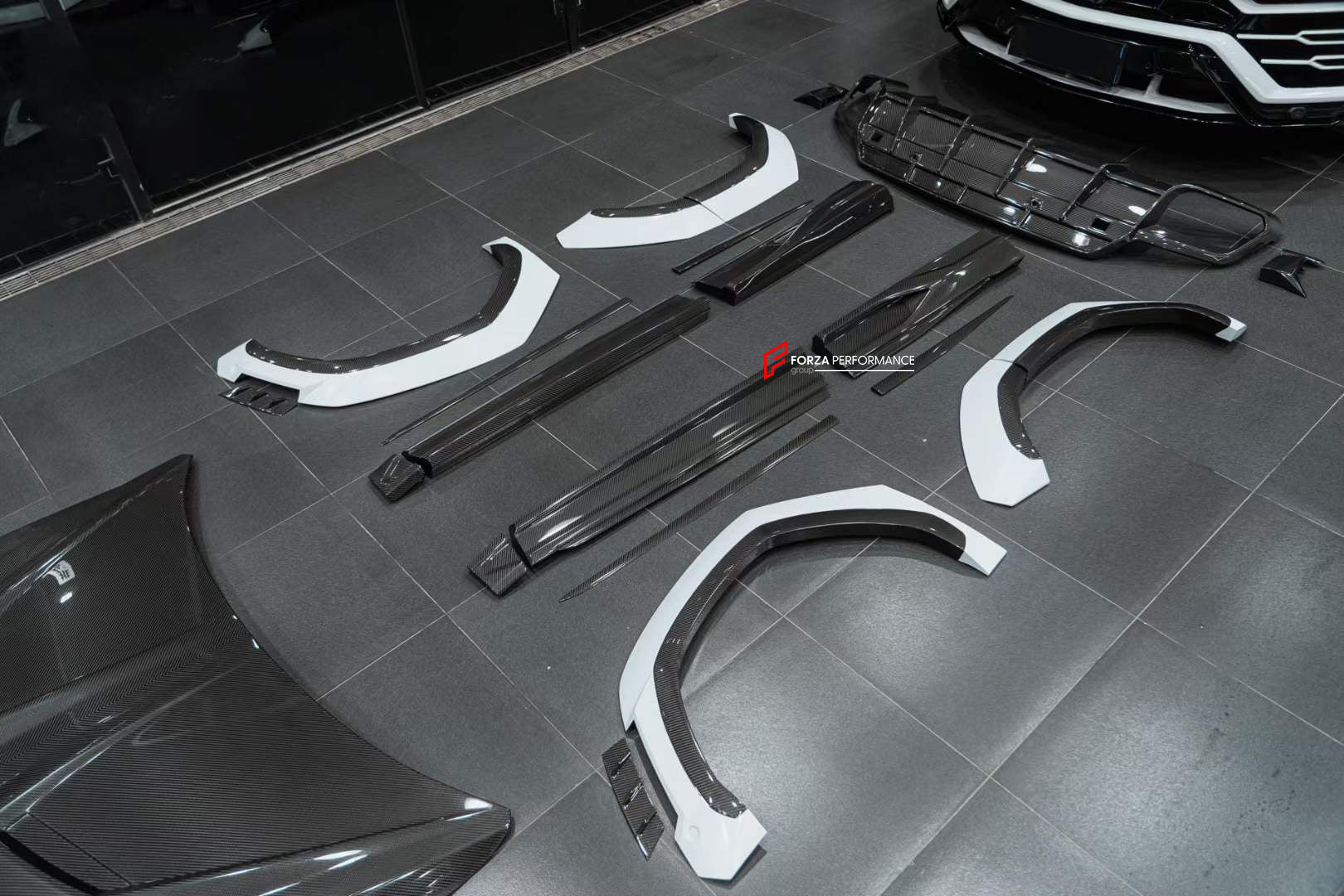 DRY CARBON BODY KIT FOR LAMBORGHINI URUS R-Style
Set includes:
Front Lip
Hood
Fender Flares
Side Skirts
Rear Spoiler
Rear Diffuser
Material: Dry Carbon
Note: Professional installation is required