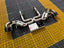 Aggressive sporty sound exhaust x pipe catback system for Chevrolet Corvette C8 2020+ (Engine: 6.2L) Exhaust brand: Forza Performance Group Set include: Catback X pipe without muffler Exhaust tips (You can choose: blue burned, chrome and carbon) Material: Stainless steel Production time: 15 working days More options available for additional EXTRA cost (not included in this listing price. Please contact for pricing): Can make that catback in titanium material