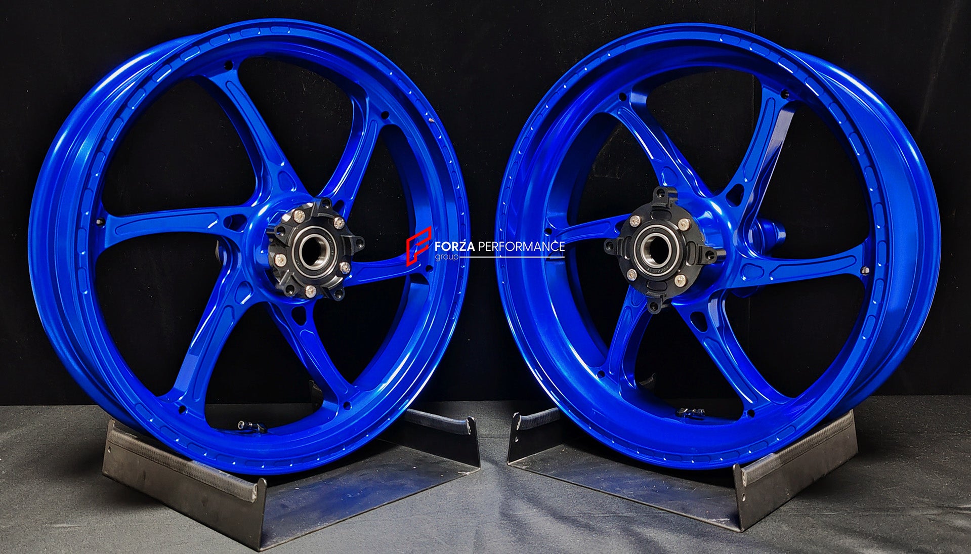 We manufacture premium quality forged motorcycle wheels rims for KAWASAKI ZX6R in any design, size, color.
Wheel sizes (motorcycle spec):
Front: 3.5 x 17
Rear: 5.5 x 17
Weight:
Front: 3.85 kg (8.48 lbs)
Rear: 4.95 kg (10.91 lbs)
Finishing: Gloss Blue
Forza Performance Group engineers and manufactures each forged motorcycle wheel individually per order. This ensures precise fitment, uncompromised strength, and unique styling. Whether for racing, touring, or daily use — our wheels are built for both