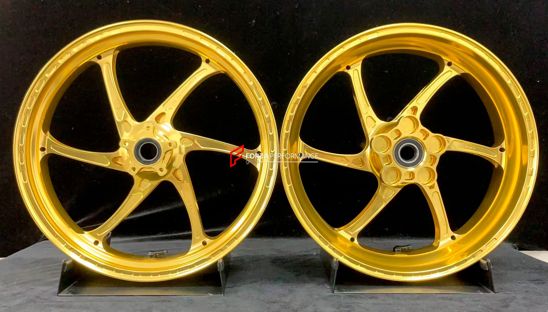 We manufacture premium quality forged motorcycle wheels rims for KTM 790 890 in any design, size, color.
Wheel sizes (motorcycle spec):
Front: 3.5 x 17
Rear: 5.5 x 17
Weight:
Front: 3.25 kg (7.16 lbs)
Rear: 4.65 kg (10.25 lbs)
Finishing: Gloss Gold
Forza Performance Group engineers and manufactures each forged motorcycle wheel individually per order. This ensures precise fitment, uncompromised strength, and unique styling. Whether for racing, touring, or daily use — our wheels are built for both pe