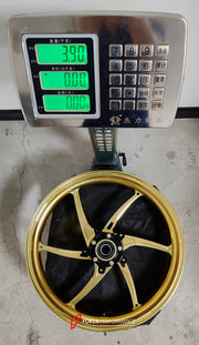 We manufacture premium quality forged motorcycle wheels rims for QJMOTOR in any design, size, color.
Wheel sizes (motorcycle spec):
Front: 3.5 x 17
Rear: 6 x 17
Weight:
Front: 3.9 kg (8.6 lbs)
Rear: 4.95 kg (10.91 lbs)
Finishing: Satin Gold
Forza Performance Group engineers and manufactures each forged motorcycle wheel individually per order. This ensures precise fitment, uncompromised strength, and unique styling. Whether for racing, touring, or daily use — our wheels are built for both performanc