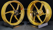 We manufacture premium quality forged motorcycle wheels rims for QJMOTOR in any design, size, color.
Wheel sizes (motorcycle spec):
Front: 3.5 x 17
Rear: 6 x 17
Weight:
Front: 3.9 kg (8.6 lbs)
Rear: 4.95 kg (10.91 lbs)
Finishing: Satin Gold
Forza Performance Group engineers and manufactures each forged motorcycle wheel individually per order. This ensures precise fitment, uncompromised strength, and unique styling. Whether for racing, touring, or daily use — our wheels are built for both performanc