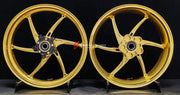 We manufacture premium quality forged motorcycle wheels rims for QJMOTOR in any design, size, color.
Wheel sizes (motorcycle spec):
Front: 3.5 x 17
Rear: 6 x 17
Weight:
Front: 3.9 kg (8.6 lbs)
Rear: 4.95 kg (10.91 lbs)
Finishing: Satin Gold
Forza Performance Group engineers and manufactures each forged motorcycle wheel individually per order. This ensures precise fitment, uncompromised strength, and unique styling. Whether for racing, touring, or daily use — our wheels are built for both performanc