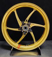 We manufacture premium quality forged motorcycle wheels rims for QJMOTOR in any design, size, color.
Wheel sizes (motorcycle spec):
Front: 3.5 x 17
Rear: 6 x 17
Weight:
Front: 3.9 kg (8.6 lbs)
Rear: 4.95 kg (10.91 lbs)
Finishing: Satin Gold
Forza Performance Group engineers and manufactures each forged motorcycle wheel individually per order. This ensures precise fitment, uncompromised strength, and unique styling. Whether for racing, touring, or daily use — our wheels are built for both performanc