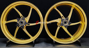We manufacture premium quality forged motorcycle wheels rims for QJMOTOR in any design, size, color.
Wheel sizes (motorcycle spec):
Front: 3.5 x 17
Rear: 6 x 17
Weight:
Front: 3.9 kg (8.6 lbs)
Rear: 4.95 kg (10.91 lbs)
Finishing: Satin Gold
Forza Performance Group engineers and manufactures each forged motorcycle wheel individually per order. This ensures precise fitment, uncompromised strength, and unique styling. Whether for racing, touring, or daily use — our wheels are built for both performanc