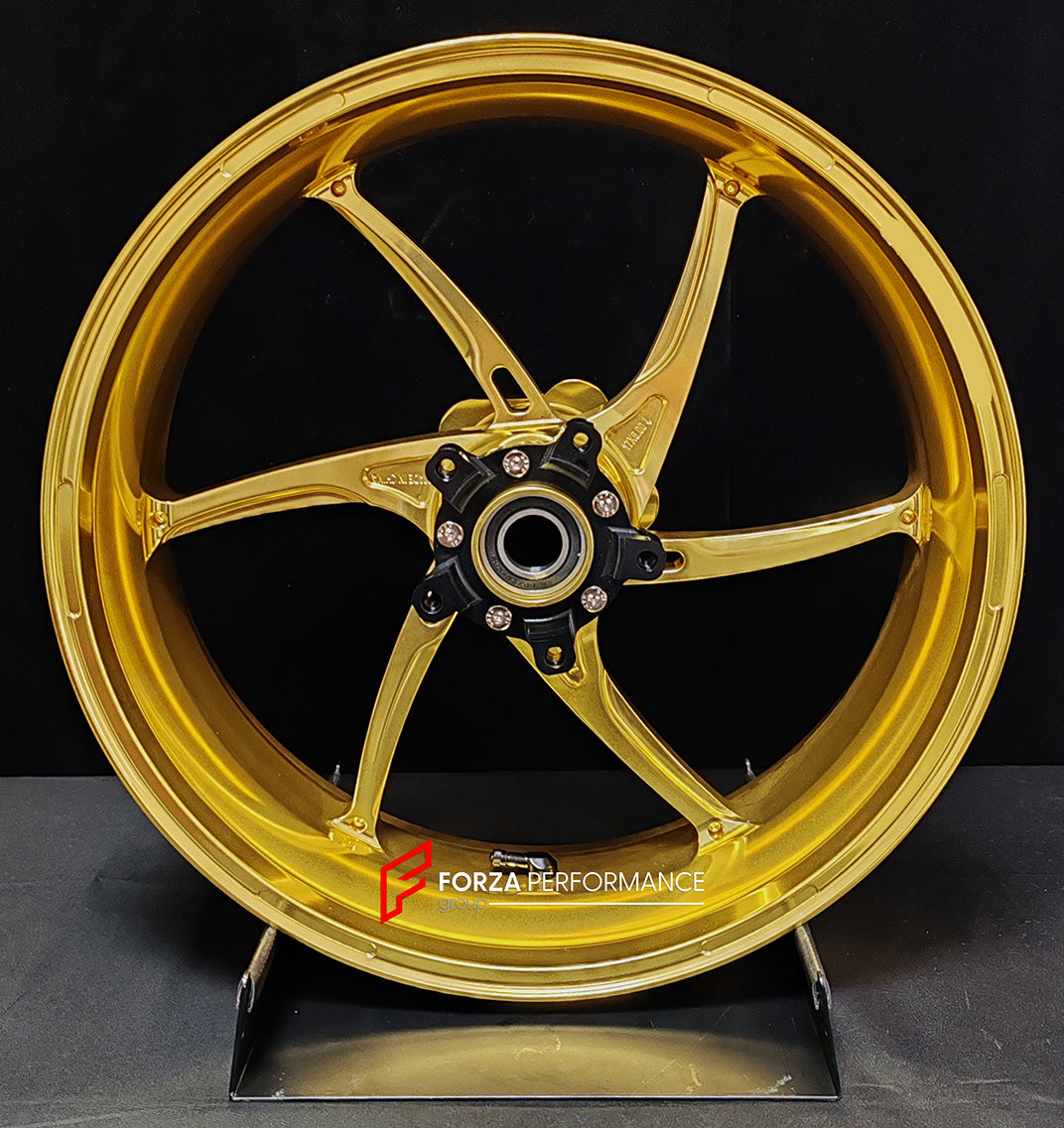 We manufacture premium quality forged motorcycle wheels rims for QJMOTOR in any design, size, color.
Wheel sizes (motorcycle spec):
Front: 3.5 x 17
Rear: 6 x 17
Weight:
Front: 3.9 kg (8.6 lbs)
Rear: 4.95 kg (10.91 lbs)
Finishing: Satin Gold
Forza Performance Group engineers and manufactures each forged motorcycle wheel individually per order. This ensures precise fitment, uncompromised strength, and unique styling. Whether for racing, touring, or daily use — our wheels are built for both performanc