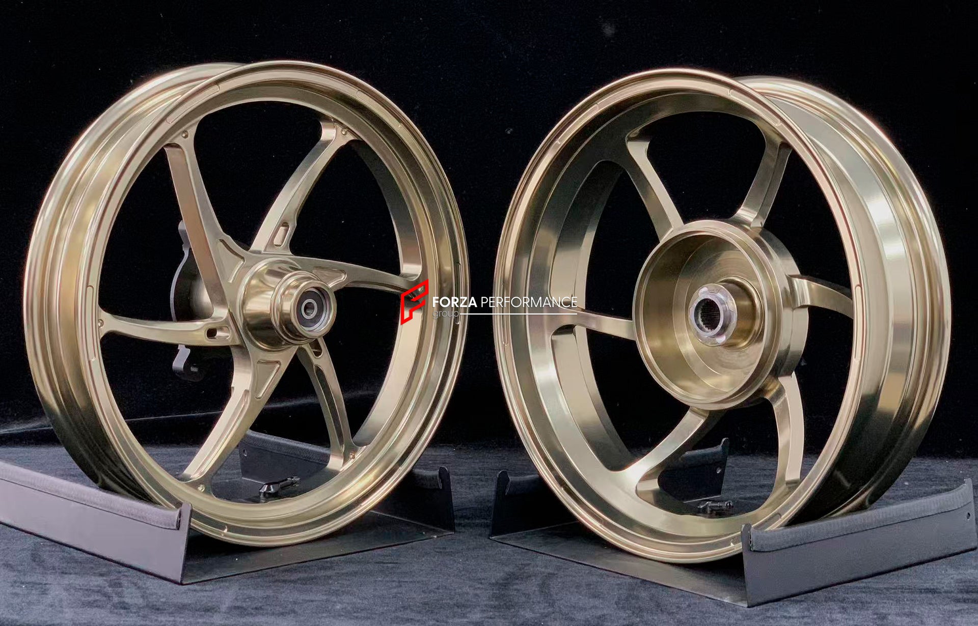We manufacture premium quality forged motorcycle wheels rims for YAMAHA in any design, size, color.
Wheel sizes (motorcycle spec):
Front: 2.5 x 14
Rear: 3.5 x 14
Weight:
Front: 2.7 kg (5.95 lbs)
Rear: 2.85 kg (6.28 lbs)
Finishing: Gloss Bronze
Forza Performance Group engineers and manufactures each forged motorcycle wheel individually per order. This ensures precise fitment, uncompromised strength, and unique styling. Whether for racing, touring, or daily use — our wheels are built for both perform