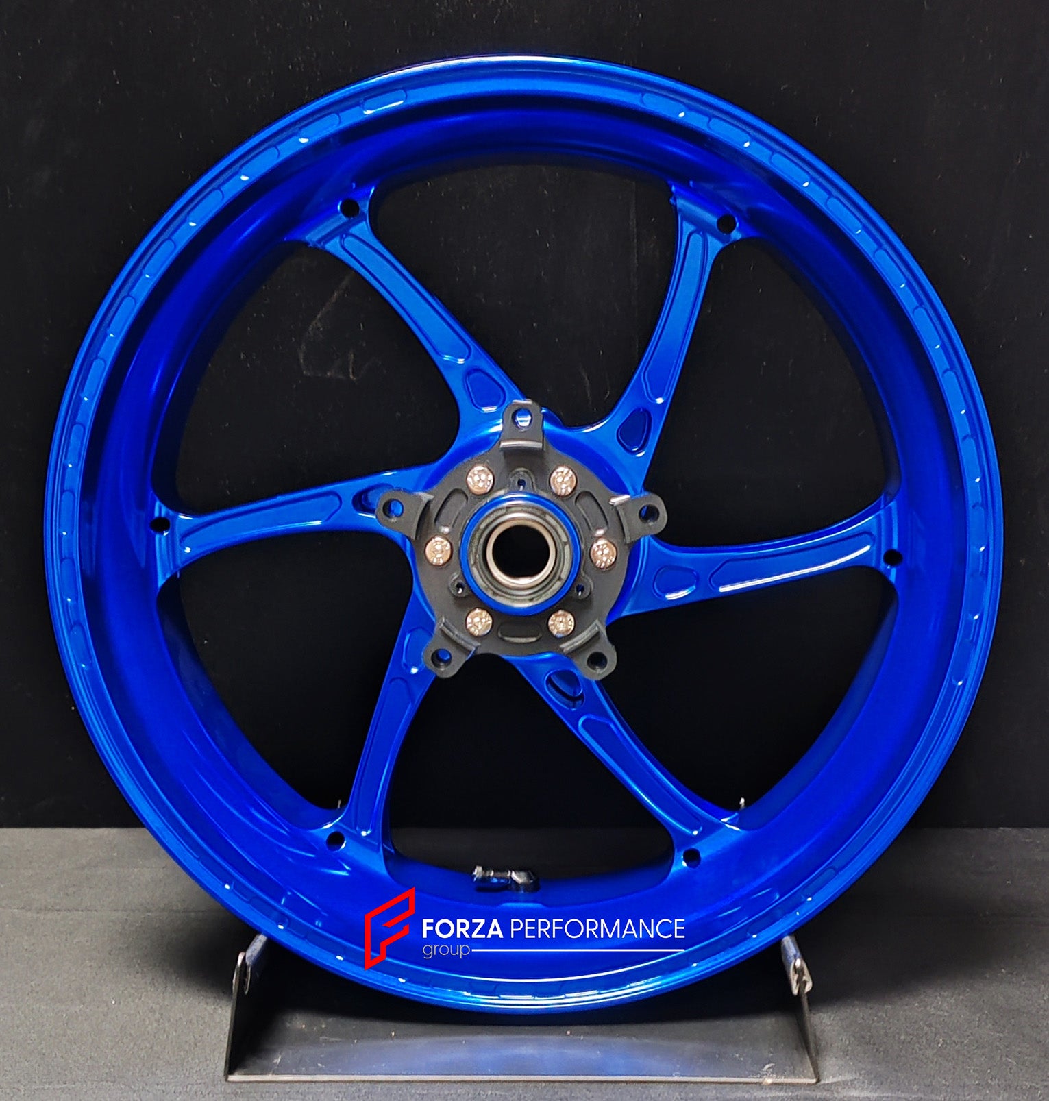 We manufacture premium quality forged motorcycle wheels rims for QJMOTOR in any design, size, color.
Wheel sizes (motorcycle spec):
Front: 3.5 x 17
Rear: 6 x 17
Weight:
Front: 4.25 kg (9.37 lbs)
Rear: 4.85 kg (10.69 lbs)
Finishing: Gloss Blue
Forza Performance Group engineers and manufactures each forged motorcycle wheel individually per order. This ensures precise fitment, uncompromised strength, and unique styling. Whether for racing, touring, or daily use — our wheels are built for both performa