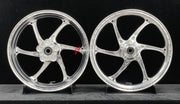 We manufacture premium quality forged motorcycle wheels rims for TRIUMPH in any design, size, color.
Wheel sizes (motorcycle spec):
Front: 3.5 x 17
Rear: 5.5 x 17
Weight:
Front: 3.95 kg (8.7 lbs)
Rear: 4.8 kg (10.58 lbs)
Finishing: Gloss Silver
Forza Performance Group engineers and manufactures each forged motorcycle wheel individually per order. This ensures precise fitment, uncompromised strength, and unique styling. Whether for racing, touring, or daily use — our wheels are built for both perfor