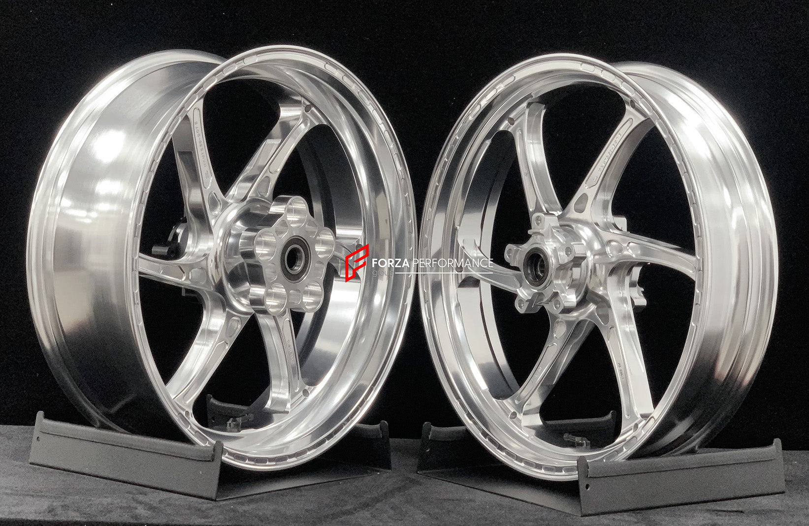 We manufacture premium quality forged motorcycle wheels rims for TRIUMPH in any design, size, color.
Wheel sizes (motorcycle spec):
Front: 3.5 x 17
Rear: 5.5 x 17
Weight:
Front: 3.95 kg (8.7 lbs)
Rear: 4.8 kg (10.58 lbs)
Finishing: Gloss Silver
Forza Performance Group engineers and manufactures each forged motorcycle wheel individually per order. This ensures precise fitment, uncompromised strength, and unique styling. Whether for racing, touring, or daily use — our wheels are built for both perfor