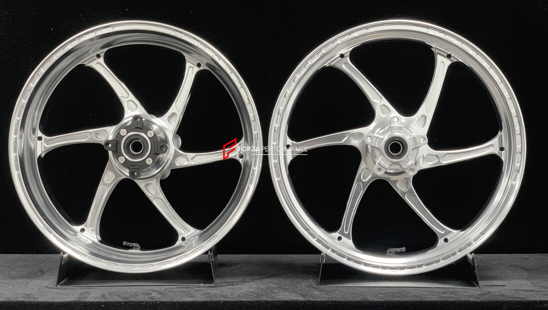 We manufacture premium quality forged motorcycle wheels rims for TRIUMPH in any design, size, color.
Wheel sizes (motorcycle spec):
Front: 3.5 x 17
Rear: 5.5 x 17
Weight:
Front: 3.95 kg (8.7 lbs)
Rear: 4.8 kg (10.58 lbs)
Finishing: Gloss Silver
Forza Performance Group engineers and manufactures each forged motorcycle wheel individually per order. This ensures precise fitment, uncompromised strength, and unique styling. Whether for racing, touring, or daily use — our wheels are built for both perfor