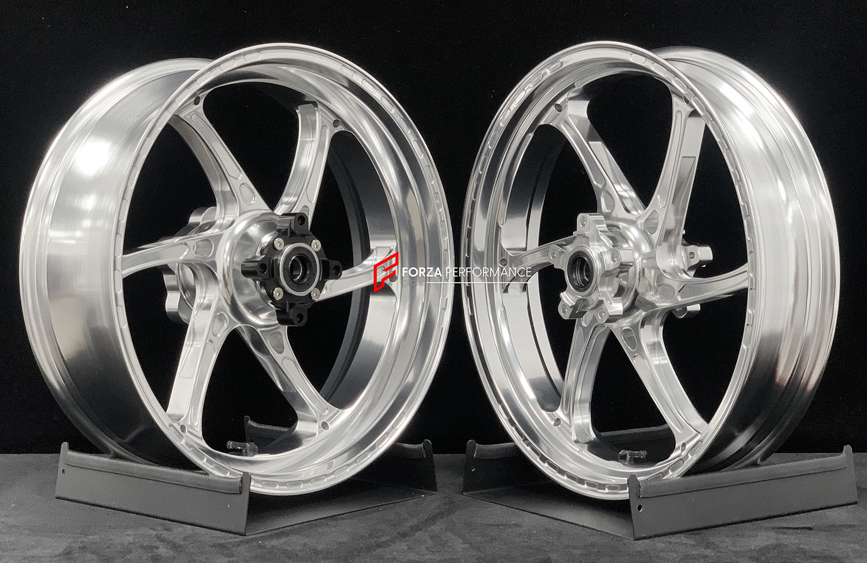 We manufacture premium quality forged motorcycle wheels rims for TRIUMPH in any design, size, color.
Wheel sizes (motorcycle spec):
Front: 3.5 x 17
Rear: 5.5 x 17
Weight:
Front: 3.95 kg (8.7 lbs)
Rear: 4.8 kg (10.58 lbs)
Finishing: Gloss Silver
Forza Performance Group engineers and manufactures each forged motorcycle wheel individually per order. This ensures precise fitment, uncompromised strength, and unique styling. Whether for racing, touring, or daily use — our wheels are built for both perfor
