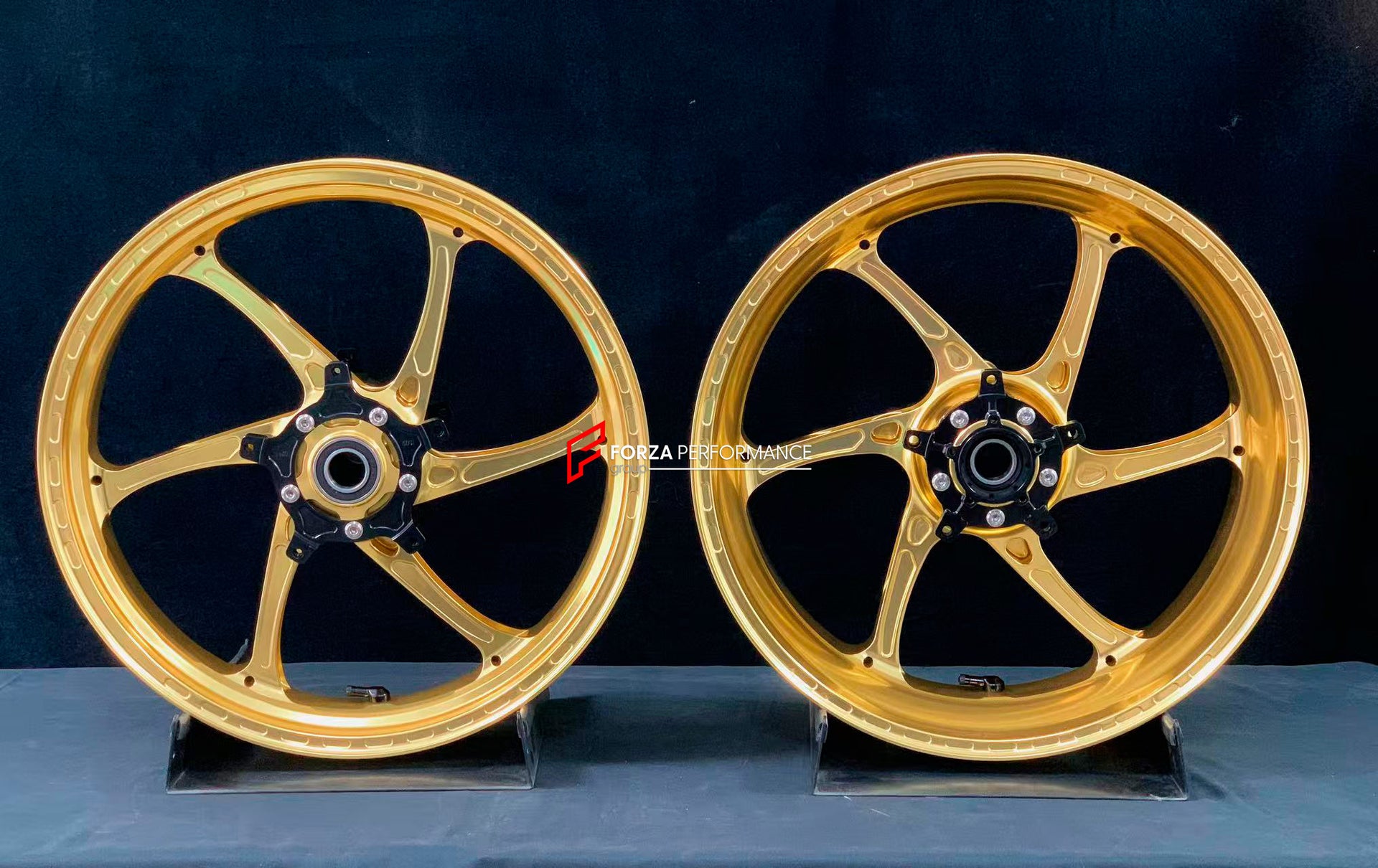 We manufacture premium quality forged motorcycle wheels rims for YAMAHA in any design, size, color.
Wheel sizes (motorcycle spec):
Front: 3.5 x 17
Rear: 6 x 17
Weight:
Front: 3.95 kg (8.7 lbs)
Rear: 4.9 kg (10.8 lbs)
Finishing: Gloss Gold
Forza Performance Group engineers and manufactures each forged motorcycle wheel individually per order. This ensures precise fitment, uncompromised strength, and unique styling. Whether for racing, touring, or daily use — our wheels are built for both performance a