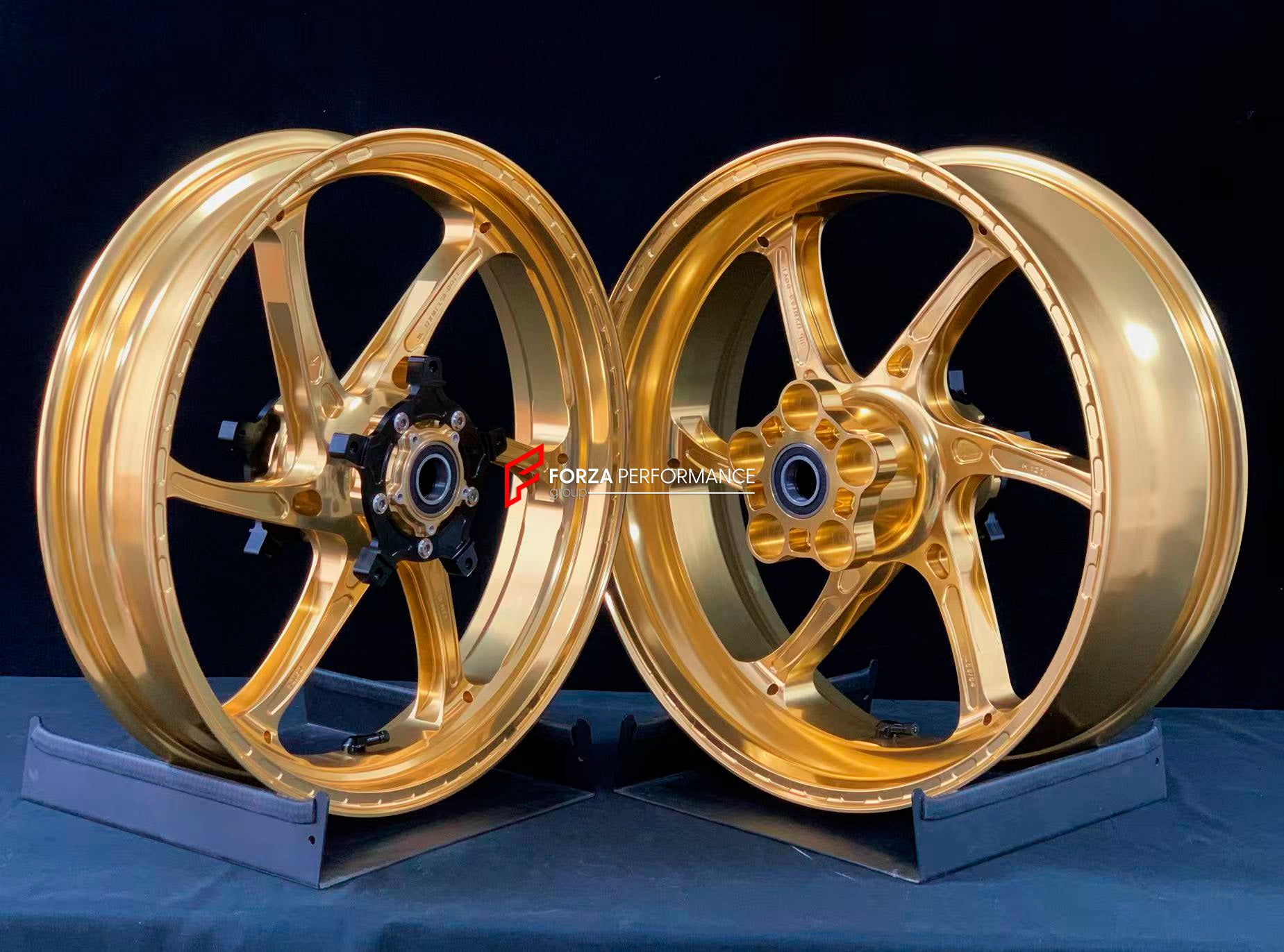 We manufacture premium quality forged motorcycle wheels rims for YAMAHA in any design, size, color.
Wheel sizes (motorcycle spec):
Front: 3.5 x 17
Rear: 6 x 17
Weight:
Front: 3.95 kg (8.7 lbs)
Rear: 4.9 kg (10.8 lbs)
Finishing: Gloss Gold
Forza Performance Group engineers and manufactures each forged motorcycle wheel individually per order. This ensures precise fitment, uncompromised strength, and unique styling. Whether for racing, touring, or daily use — our wheels are built for both performance a
