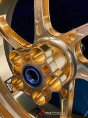 We manufacture premium quality forged motorcycle wheels rims for YAMAHA in any design, size, color.
Wheel sizes (motorcycle spec):
Front: 3.5 x 17
Rear: 6 x 17
Weight:
Front: 3.95 kg (8.7 lbs)
Rear: 4.9 kg (10.8 lbs)
Finishing: Gloss Gold
Forza Performance Group engineers and manufactures each forged motorcycle wheel individually per order. This ensures precise fitment, uncompromised strength, and unique styling. Whether for racing, touring, or daily use — our wheels are built for both performance a