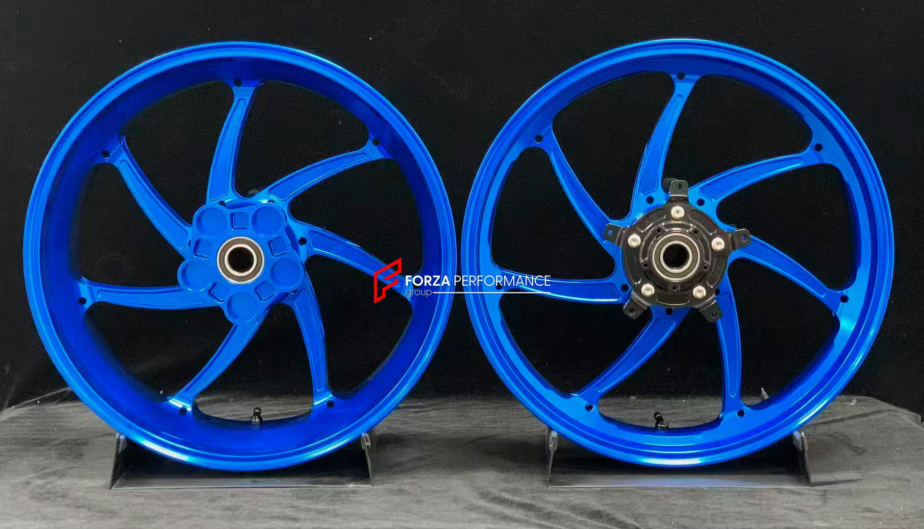 We manufacture premium quality forged motorcycle wheels rims for YAMAHA in any design, size, color.
Wheel sizes (motorcycle spec):
Front: 3.5 x 17
Rear: 6 x 17
Weight:
Front: 4.3 kg (9.48 lbs)
Rear 4.9 kg (10.8 lbs)
Finishing: Gloss Blue
Forza Performance Group engineers and manufactures each forged motorcycle wheel individually per order. This ensures precise fitment, uncompromised strength, and unique styling. Whether for racing, touring, or daily use — our wheels are built for both performance a