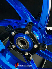 We manufacture premium quality forged motorcycle wheels rims for YAMAHA in any design, size, color.
Wheel sizes (motorcycle spec):
Front: 3.5 x 17
Rear: 6 x 17
Weight:
Front: 4.3 kg (9.48 lbs)
Rear 4.9 kg (10.8 lbs)
Finishing: Gloss Blue
Forza Performance Group engineers and manufactures each forged motorcycle wheel individually per order. This ensures precise fitment, uncompromised strength, and unique styling. Whether for racing, touring, or daily use — our wheels are built for both performance a