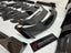 DRY CARBON BODY KIT for Aston Martin DBX AM8 2020 - 2024
Set includes:
Front Lip
Front Canards
Hood Air Vents
Side Mirrors
Side Fenders
Side Air Vents
Side Skirts
Rear Bumper
Rear Spoiler Wing
Exhaust System
Exhaust Tips
Material: Dry Carbon
NOTE: Professional installation is required.
