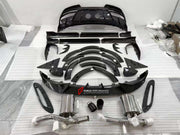 DRY CARBON BODY KIT for ASTON MARTIN DBX  Set includes:  Front Lip Side Fenders Hood Air Vents Side Air Vents Front Canards Side Skirts Rear Bumper Exhaust System Exhaust Tips