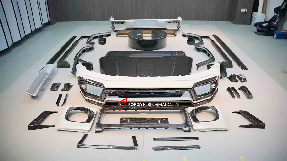 DRY CARBON BODY KIT FOR MERCEDES-BENZ G CLASS W464 W463A
Set includes:
Front Bumper Assembly
Front Bumper Trims
Hood
Side Fenders
Side Skirt
Spare Tire Cover
Rear Bumper
Material: Dry carbon fiber
NOTE: Professional installation is required