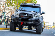 DRY CARBON BODY KIT for MERCEDES-BENZ W464 G63 4x4 G500 G550 2019 - 2022  Set includes:  Hood Front Grille Turn Signal Covers Side Fenders Side Trims Side Moldings Side Skirts Roof LED Bar Roof Rack Roof Ladder Spare Tire Holder Rear Bumper Reinforcement