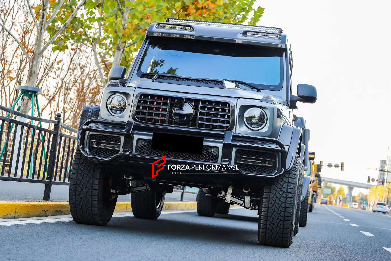 DRY CARBON BODY KIT for MERCEDES-BENZ W464 G63 4x4 G500 G550 2019 - 2022  Set includes:  Hood Front Grille Turn Signal Covers Side Fenders Side Trims Side Moldings Side Skirts Roof LED Bar Roof Rack Roof Ladder Spare Tire Holder Rear Bumper Reinforcement