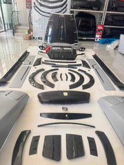 DRY CARBON CONVERSION BODY KIT for ROLLS-ROYCE CULLINAN SERIES 1 2018 - 2025 upgrade to SERIES 2 FACELIFT
Set includes:
Front Lip
Front Bumper
Front Bumper Meshes
Headlights
Front Grille Frame
Hood / Bonnet
Front Fenders
Fenders Flares
Door Covers
Side Skirts
Roof Spoiler
D-Pillar Panel
Rear Trunk Spoiler
Rear Panel
Rear Bumper
Rear Diffuser
Exhaust Tips
Material: Dry Carbon