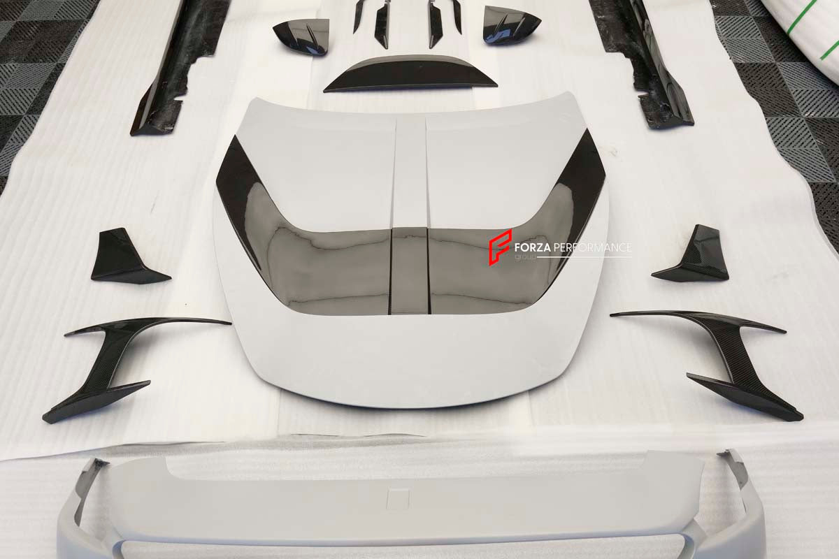 CARBON BODY KIT for FERRARI ROMA
Set includes:
Front Bumper
Front Grille
Hood / Bonnet
Side Mirror Covers
Side Trims
Side Skirts
Trunk Panel
Rear Spoiler
Rear Diffuser
Material: Carbon Fiber