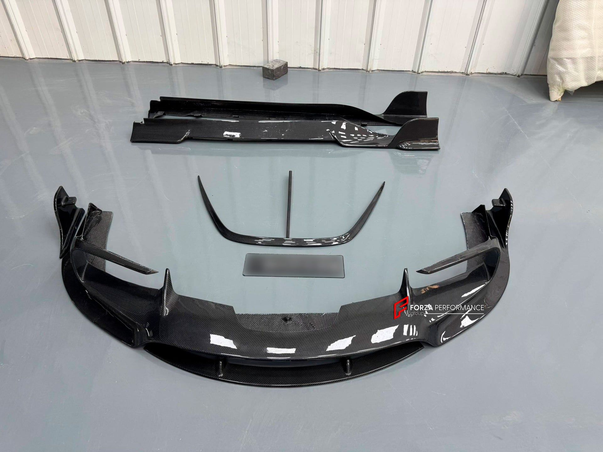 DRY CARBON BODY KIT for FERRARI SF90
Set includes:
Front Lip
Front Bumper Canards
Front Lid Trim
Front Fenders
Side Mirror Covers
Rear Air Vent Inlet Trim
Side Skirts
Rear Spoiler
Rear Diffuser
Material: Carbon Fiber
Note: Professional installation is required.