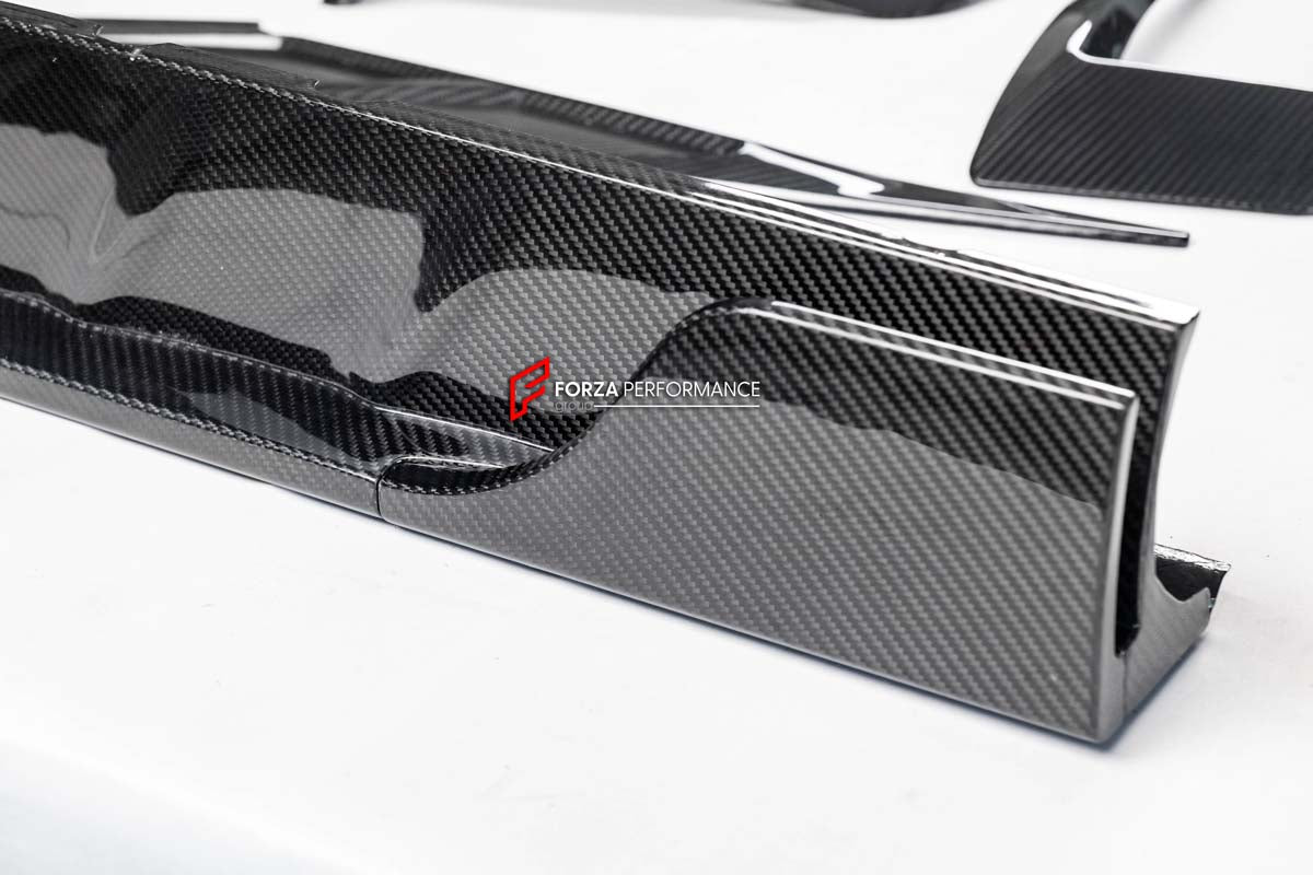 DRY CARBON FIBER BODY KIT for ROLLS ROYCE SPECTRE 2023+ 
Set includes:
Front Lip
Front Bumper Trims
Hood/Bonnet
Side Fender Vents
Side Skirts
Rear Spoiler
Rear Diffuser
Material: Carbon Fiber