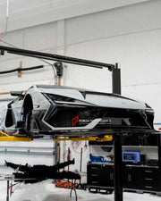 FORGED CARBON BODY KIT for LAMBORGHINI REVUELTO 2023+
Set includes:
Front Lip
Middle Air Splitter for Front Bumper
Air Splitter for Front Bumper
Front Radar Cover
Headlight Covers
Hood / Bonnet
Side Skirts
Rear Spoiler
Rear Diffuser
Material: Dry Carbon or Forged Carbon