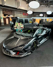 FORGED CARBON BODY KIT for LAMBORGHINI REVUELTO 2023+
Set includes:
Front Lip
Middle Air Splitter for Front Bumper
Air Splitter for Front Bumper
Front Radar Cover
Headlight Covers
Hood / Bonnet
Side Skirts
Rear Spoiler
Rear Diffuser
Material: Dry Carbon or Forged Carbon