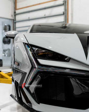 FORGED CARBON BODY KIT for LAMBORGHINI REVUELTO 2023+
Set includes:
Front Lip
Middle Air Splitter for Front Bumper
Air Splitter for Front Bumper
Front Radar Cover
Headlight Covers
Hood / Bonnet
Side Skirts
Rear Spoiler
Rear Diffuser
Material: Dry Carbon or Forged Carbon