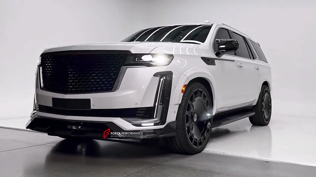 WIDE BODY KIT for CADILLAC ESCALADE 2021 - 2024
Set includes:
Front Lip
Front Bumper Trims
Grille Cover
Roof Spoiler 
Rear Diffuser 
Exhaust Tips
Material: Carbon Fiber
Note: Professional installation is required.
CONTACT US FOR PRICING 
Payment ►
Visa
Mastercard
PayPal with a credit card (add 4.4% at checkout)
Payoneer
Cryptocurrency
Shipment ►
By express DHL/UPS/TNT/FedEx
To the local international airport
Special line by air
Special line by the sea
To Europe and the UK by train
Please let us